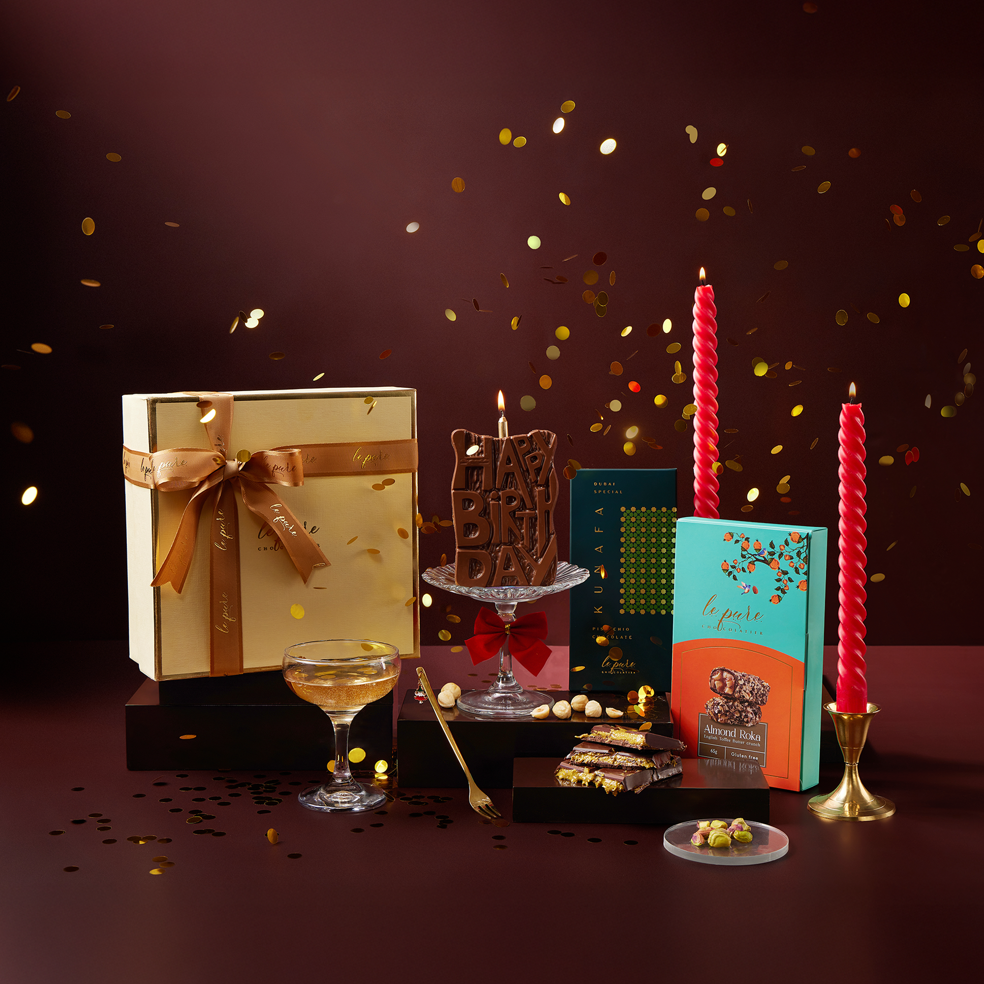 Gourmet chocolate gift box for Birthday Gifting which has Happy Birthday Chocolate Bar, Kunafa Chocolate Bar & Almond Roka Toffee.