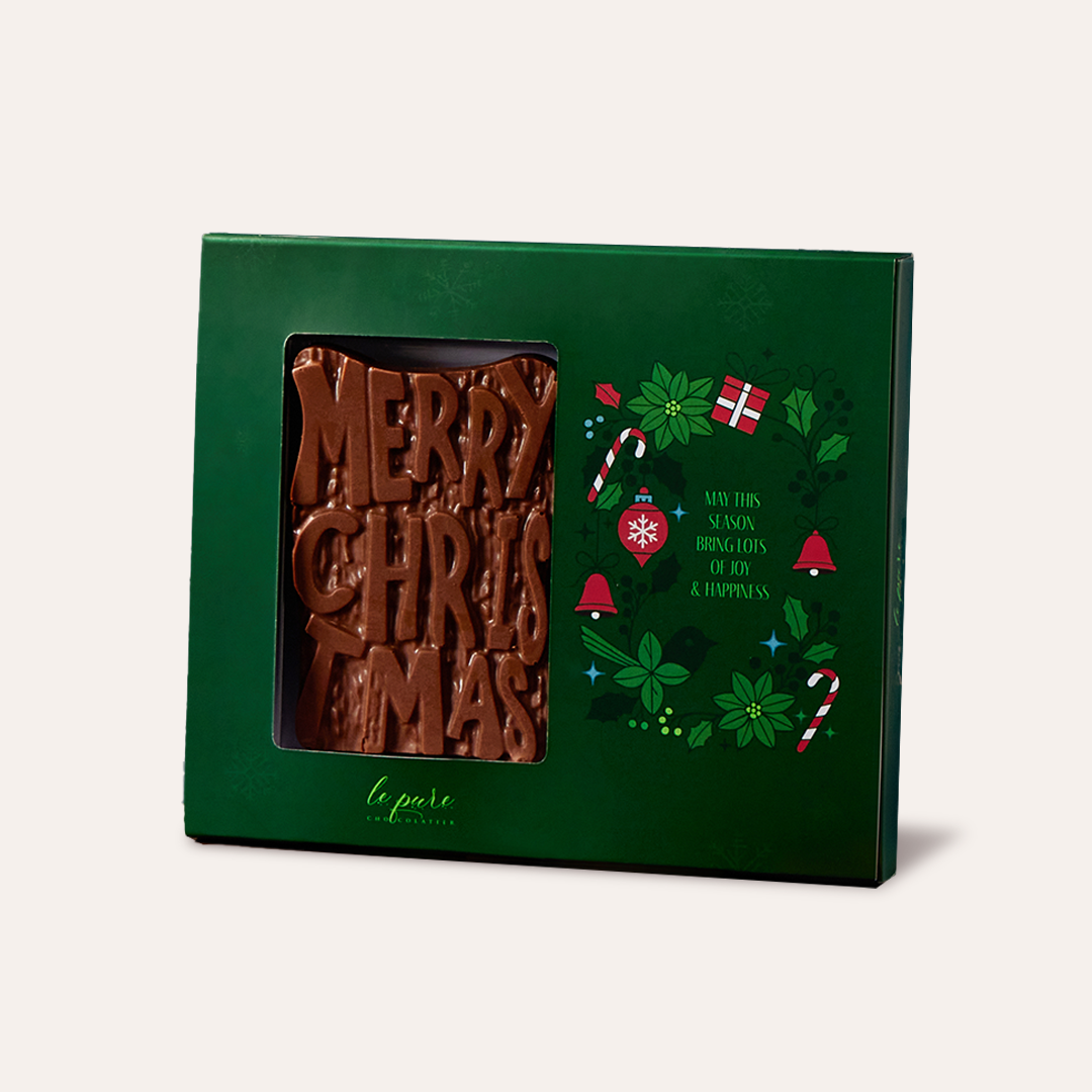 Merry Christmas Chocolate Bar with Walnut Brownie Fudge Filling in it.