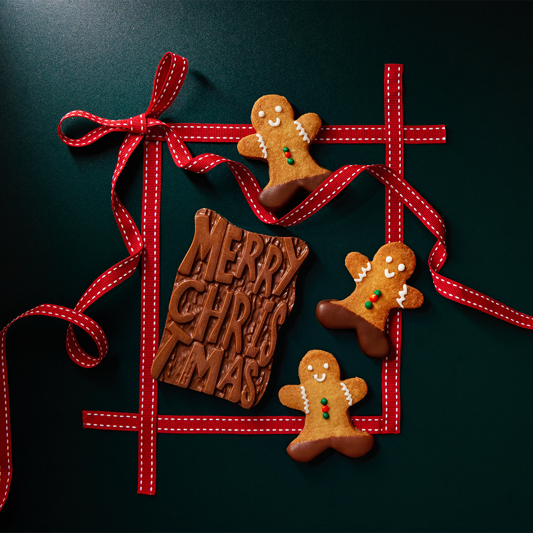 Merry Christmas Chocolate Bar with Walnut Brownie Fudge Filling in it.