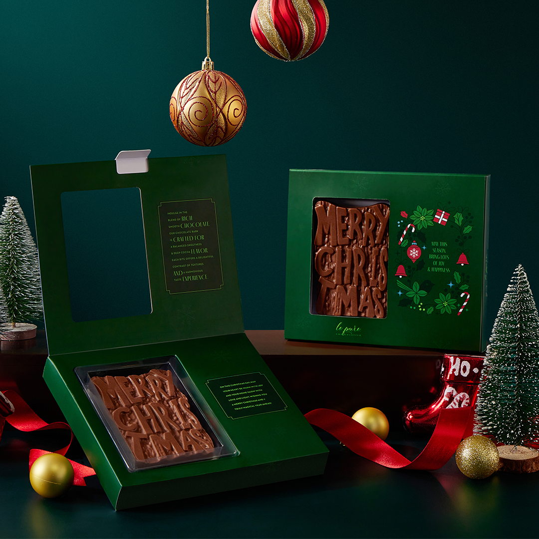 Merry Christmas Chocolate Bar with Walnut Brownie Fudge Filling in it.